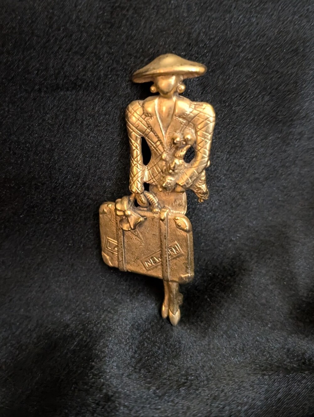 #3.  Gold-Tone Travel Lady With Poodle & Suitcase Brooch